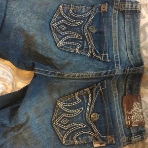 MEK denim slim boot sold exclusively at the Buckle